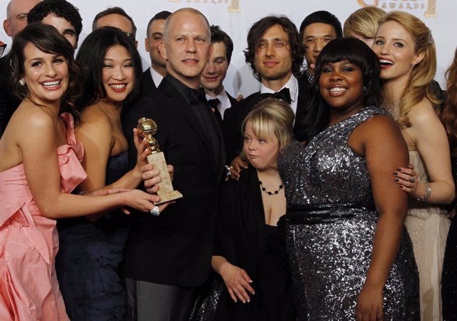 Murphy, creator of the TV series 'Glee', and cast members pose with the award fo