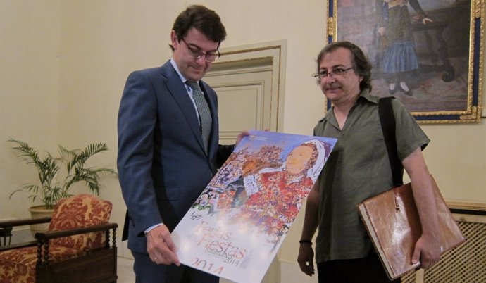 Mañueco y el pintor Miguel Elías miran el nuevo cartel de las fiestas