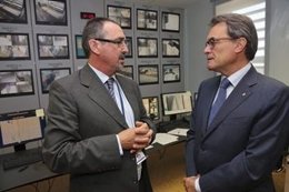 El presidente de la Generalitat, Artur Mas, y el director del centro, Josep Font