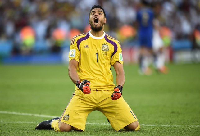 Argentina's goalkeeper Romero reacts to an offside goal by teammate Higuain duri
