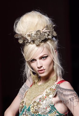 Model Andrej Pejic presents a creation by French designer Jean Paul Gaultier as 