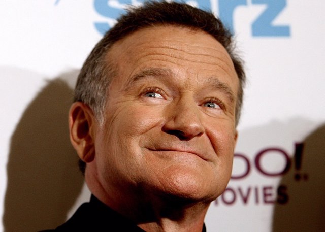Actor Robin Williams poses at 10th annual