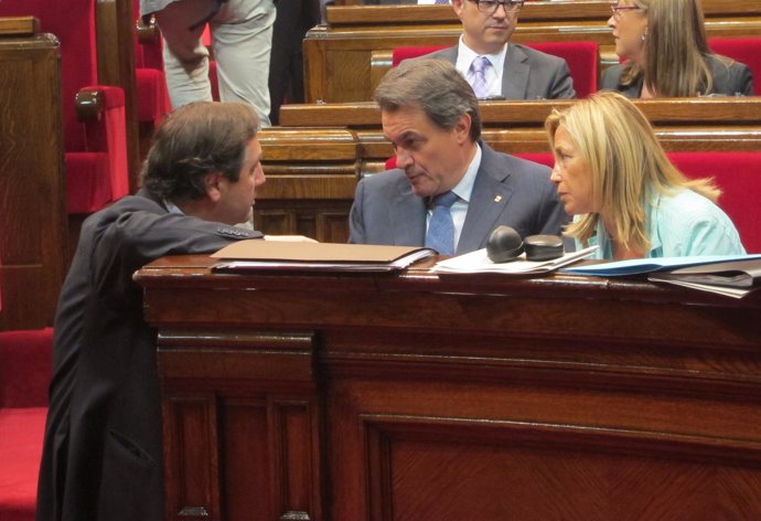 J.M.Pelegrí, Artur Mas y J.Ortega, en el Parlament