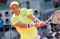 Bautista salva el domingo de la 'Armada' y se medirá con Federer en octavos