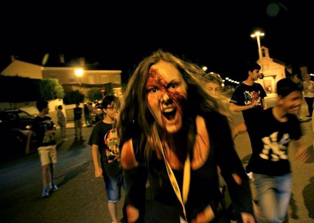 Una participante en el evento 'Survival Zombie' en Collado Villalba