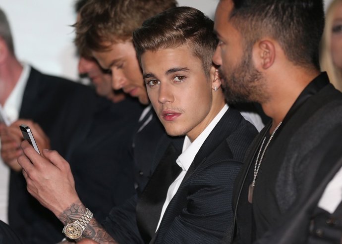 Musician Justin Bieber Attends The Amber Lounge F