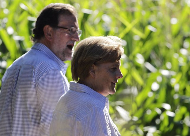 Rajoy y Merkel, en su camino a Santiago