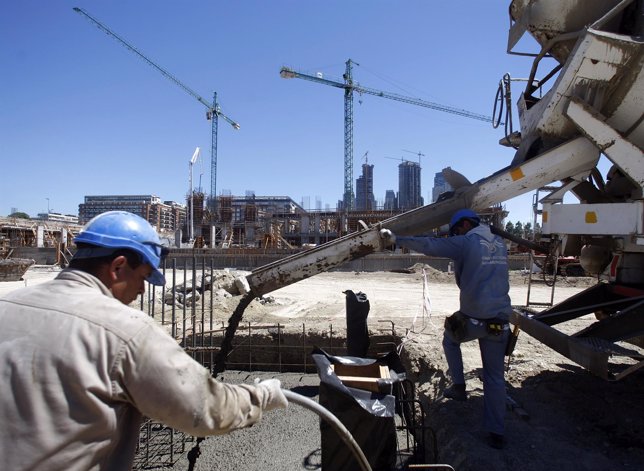 Employees work at construction site in Buenos Aires' Puerto Madero neighborhood