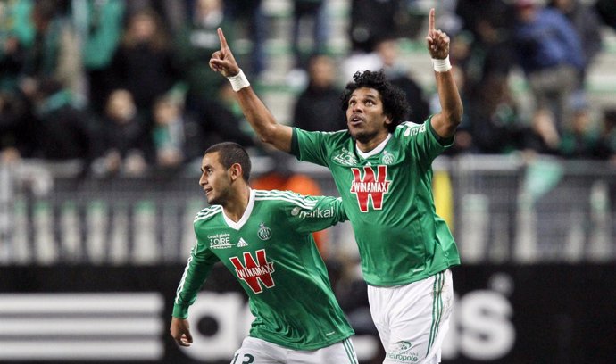 Brandao of St Etienne celebrates with teammate Ghoulam after scoring against Lil