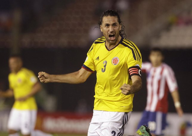 Colombia's Yepes celebrates his second goal against Paraguay during a 2014 World