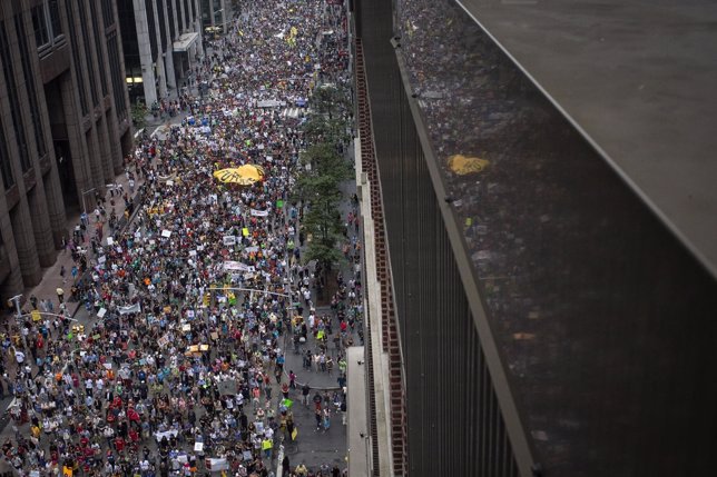 Tens of thousands march down 6th Avenue while taking part in the People's Climat
