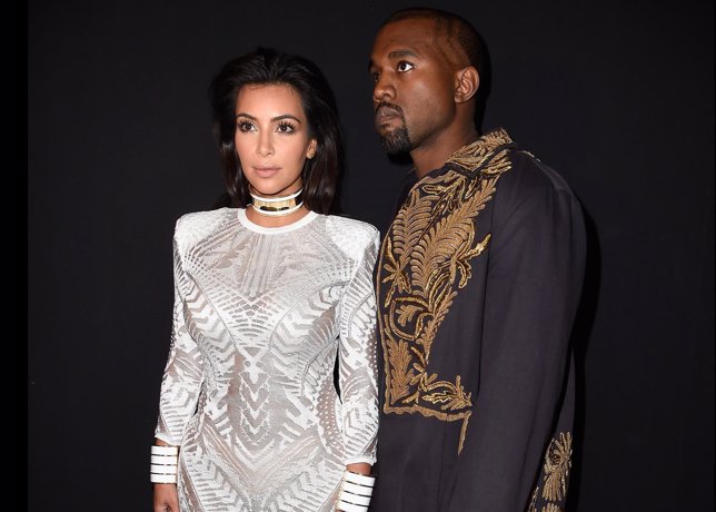 PARIS, FRANCE - SEPTEMBER 25:  (L-R) Kim Kardashian and Kanye West attend the Ba