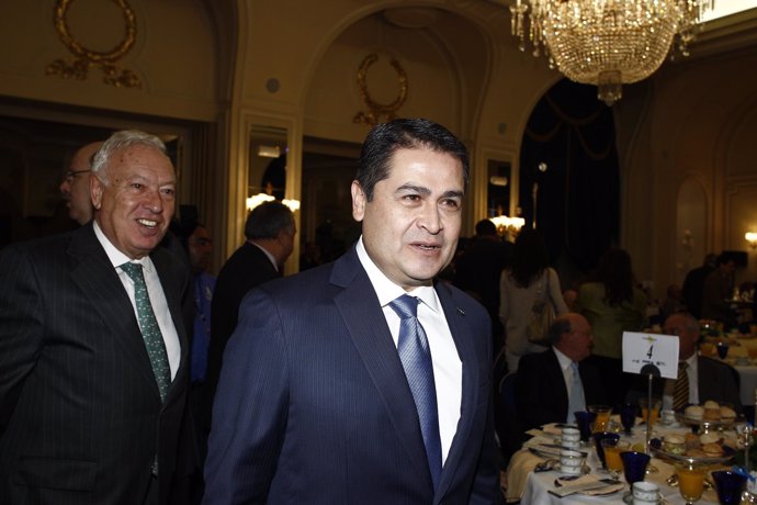 García-Margallo y Juan Orlando Hernández