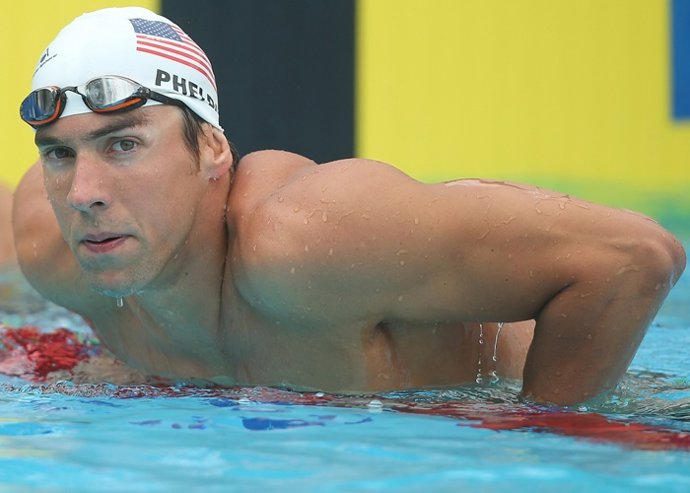 Michael Phelps of the USA looks on after  sw
