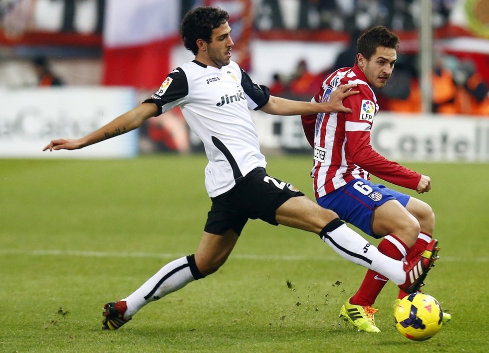 Parejo y Koke en un Atlético - Valencia