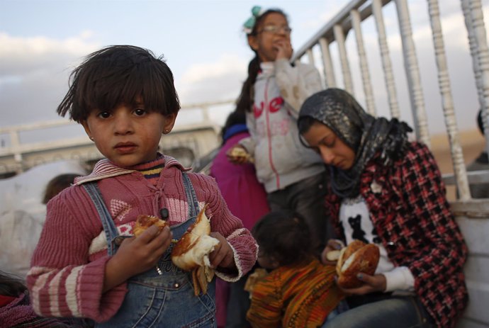 Niño kurdo refugiado por ofensiva de Estado Islámico