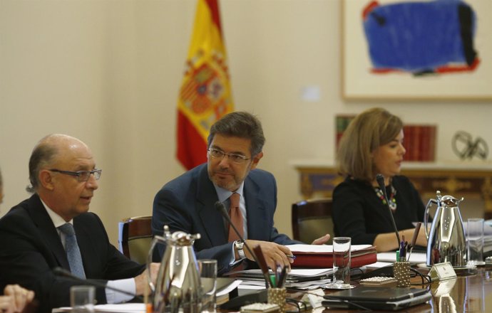Rafael Catalá en el Consejo de Ministros con Santamaría y Montoro