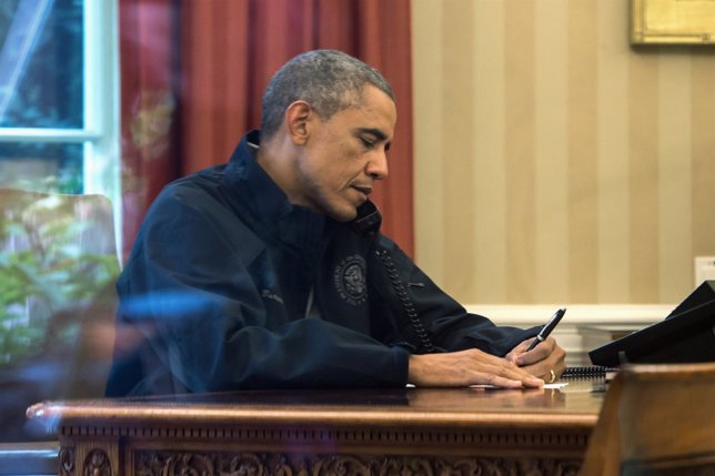 Obama gets an update on the response to the Ebola diagnosis in Dallas during a c