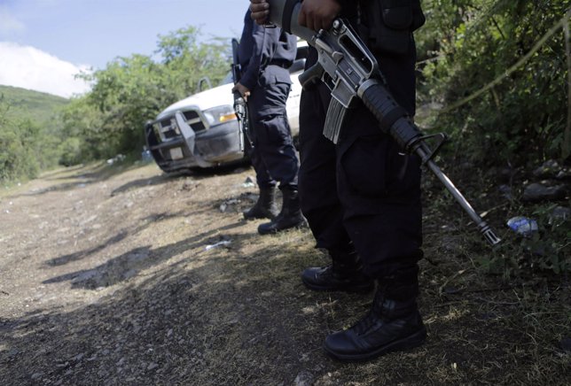 Policía México dispara a estudiantes