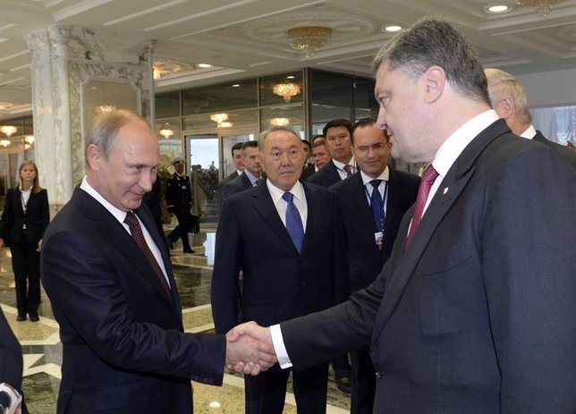 Los mandatarios ruso y ucraniano, Putin y Poroshenko