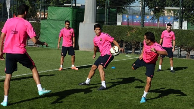 Luis Suárez y Xavi en el entrenamiento del Barcelona