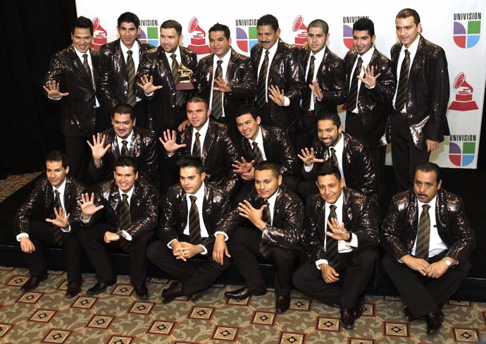 Banda el Recodo pose with the Latin Grammy Award they won at the 11th annual Lat