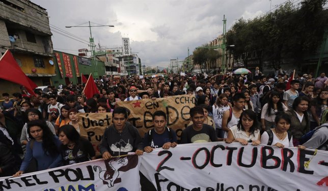 Students and people from civil organizations take part in a march marking the 46