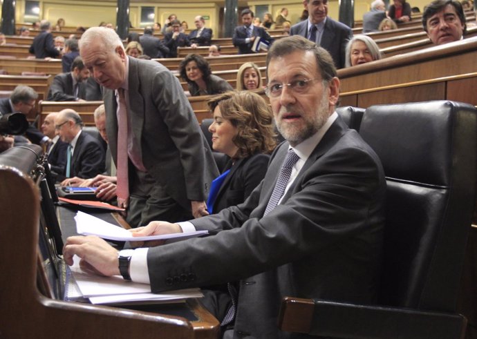 Mariano Rajoy, En Su Escaño Del Banco Azul Del Hemiciclo