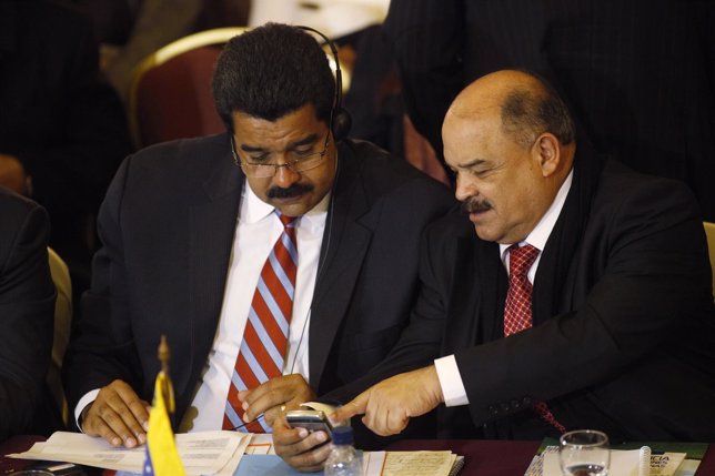 Presidente de Venezuela, Nicolás Maduro, y del  Banco Central, Nelson Merentes