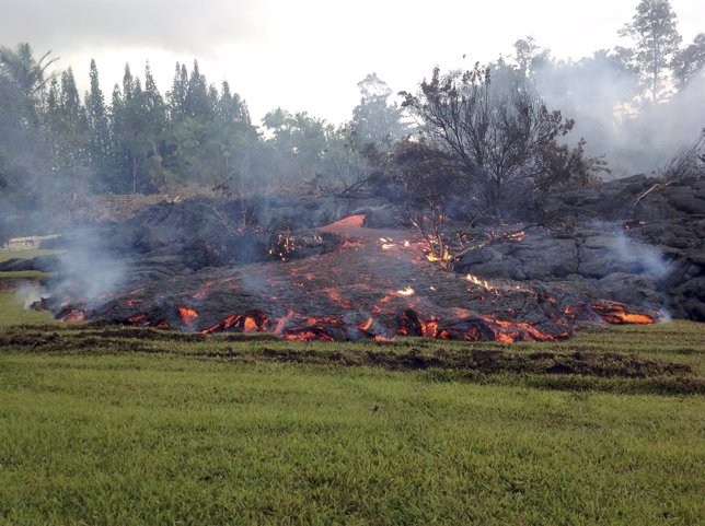 A breakout occurs from an inflated lobe of the Kilauea volcano lava flow as seen