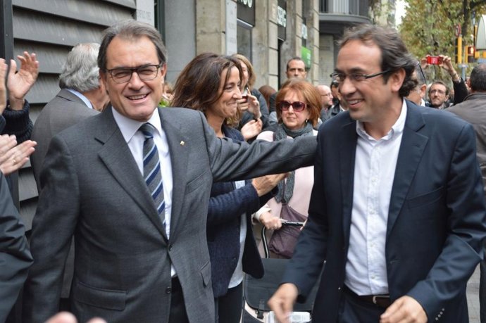 Artur Mas, Mercè Conesa, Josep Rull entrando en CDC al dia siguiente del 9N
