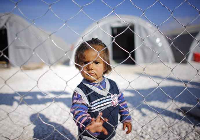 Un niño kurdo refugiado tras su salida de Kobani
