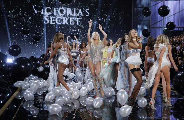 Models present creations during the 2014 Victoria's Secret Fashion Show in Londo