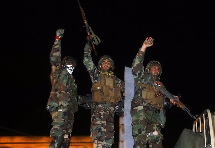 Combatientes peshmerga de camino a Kobani en octubre