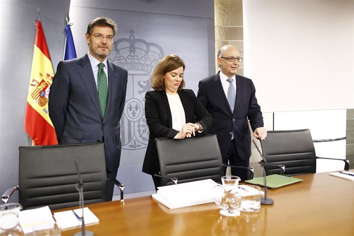 Santamaría, Montoro y Rafael Catalá tras el Consejo de Ministros