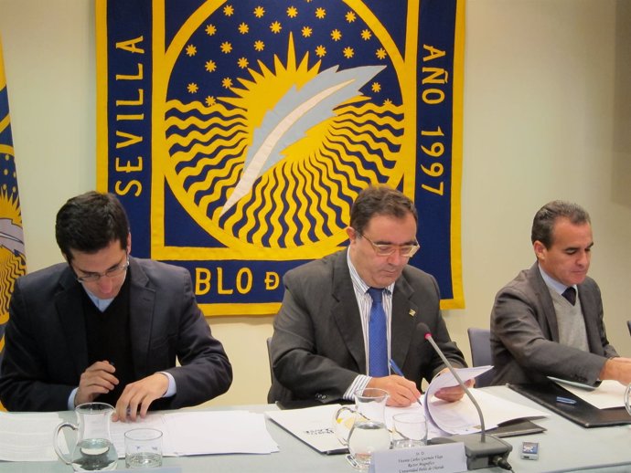 Firma de convenio entre UPO, Cáritas Universitaria, La Caixa y Fundación Persán