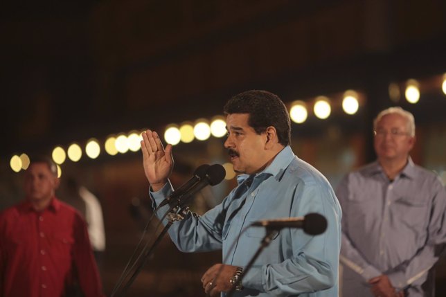 Venezuela's President Nicolas Maduro talks to the media at Havana's Jose Marti A