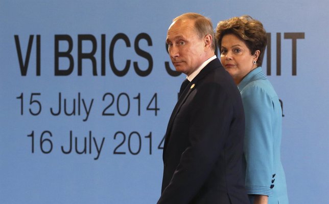Brazil's President Rousseff walks with Russian President Putin before the 6th BR