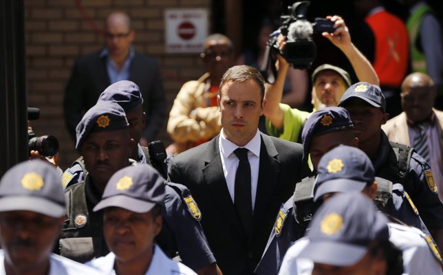 South African Olympic and Paralympic sprinter Oscar Pistorius leaves the North G