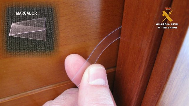 Señal en puertas para robar 