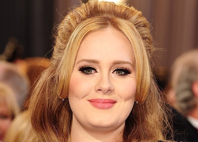 File photo dated 24/02/13 of Adele whose record label boss says he is "plea