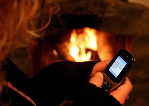 Teléfono móvil SMS chimenea