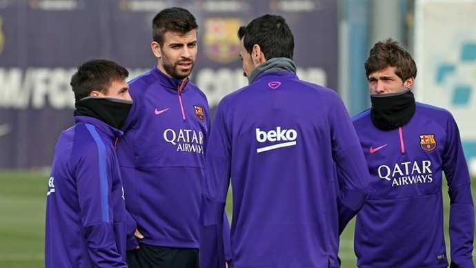Piqué, Busquets en un entrenamiento del Barcelona