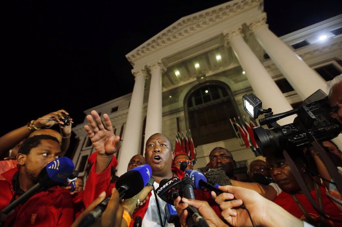 Economic Freedom Fighters leader Julius Malema speaks after he was ordered out o