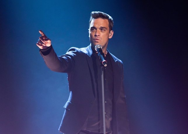 Robbie Williams of Take That performs durin