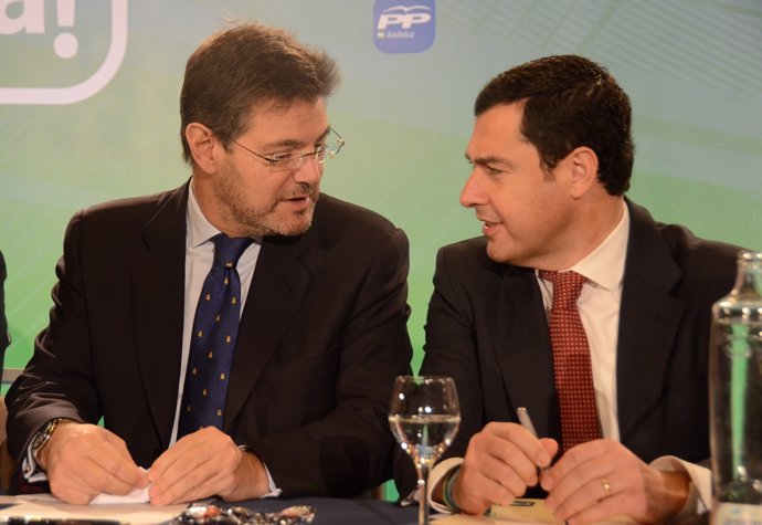 El ministro Rafael Catalá y el presidente del PP-A, Juanma Moreno, en Sevilla