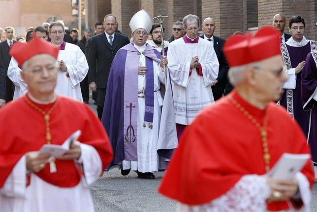 Pope Francis arrives in a procession to celebrate Ash Wednesday mass at the Basi