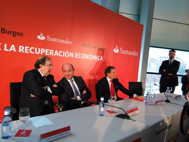 Herrera junto a De Guindos en el coloquio de Dirario de Burgos y Santander