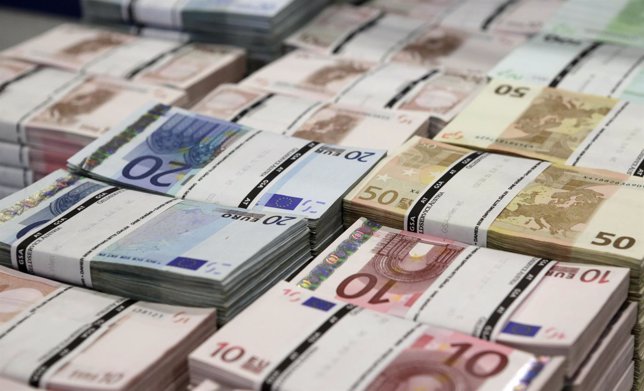 Wads of euro banknotes are stacked at the GSA company's headquarters in Vienna