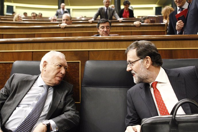 José Manuel García Margallo y Mariano Rajoy.